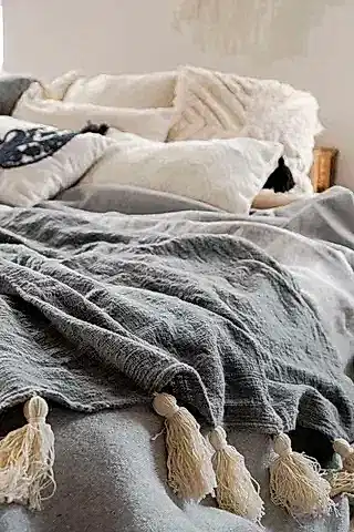 BLUE HAND STITCHED COVER WITH WHITE TASSELS