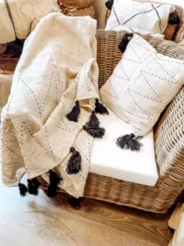 Stitched Pillow with black tassels